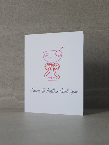 "Cheers to another great year" Greeting Card